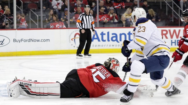Schneider makes 34 saves, wins again as Devils beat Sabres